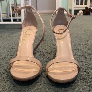 Heel with ankle strap